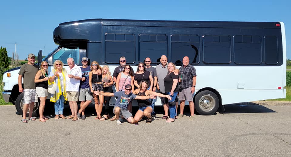 Tour group in front of the bus