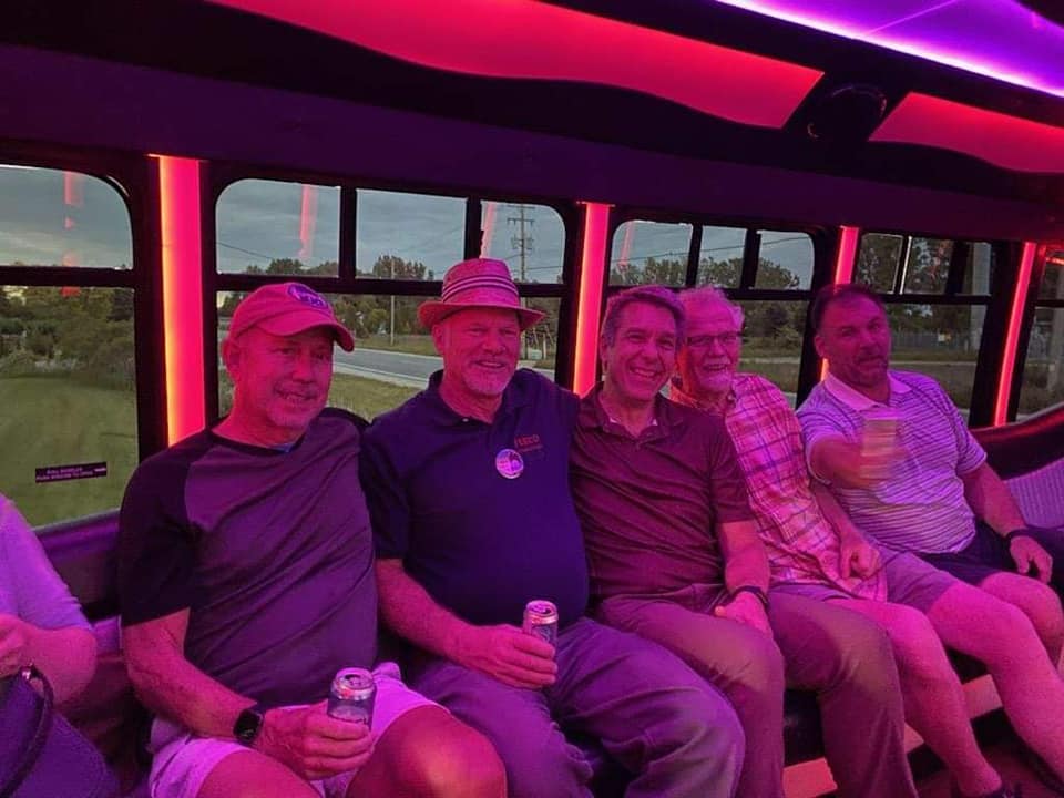 Guests on the bus at dusk