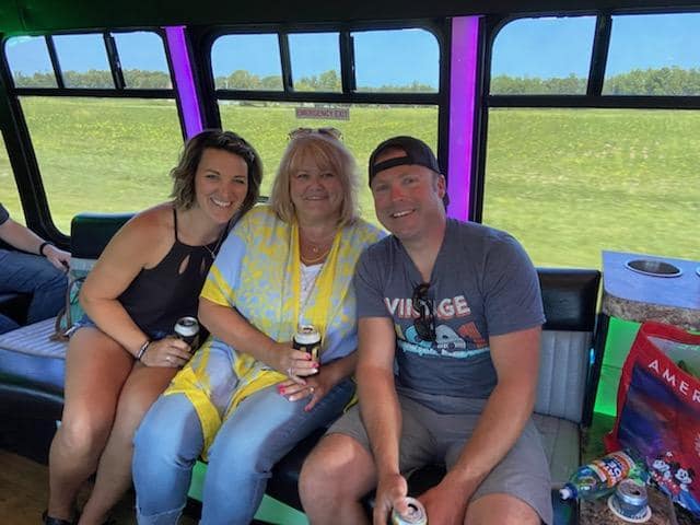 Guests riding past farmland